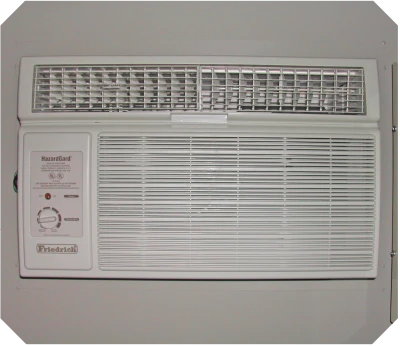 Wall-mounted HVAC unit inside a VersaBilt building