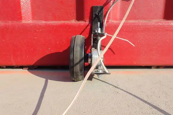 Linear encoder mounted on a test building wall