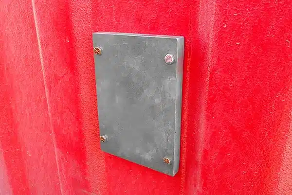 Pressure gauge mounted on a test building wall